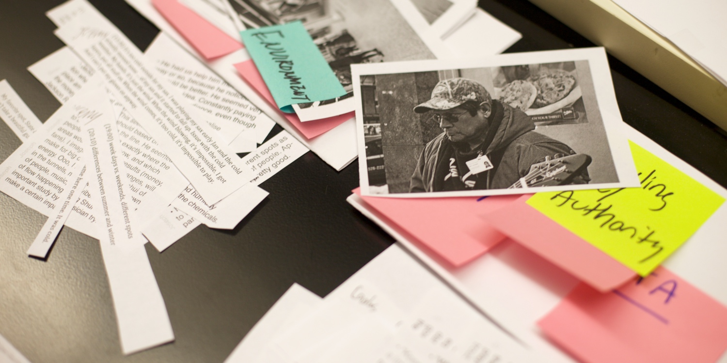 UXR interview transcript clippings splayed on a table