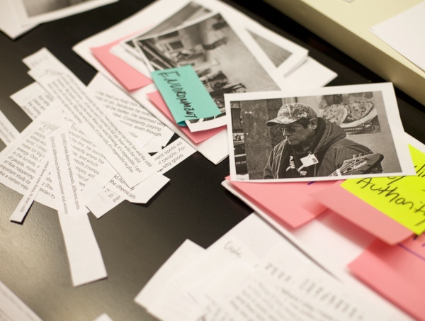 UXR interview transcript clippings splayed on a table